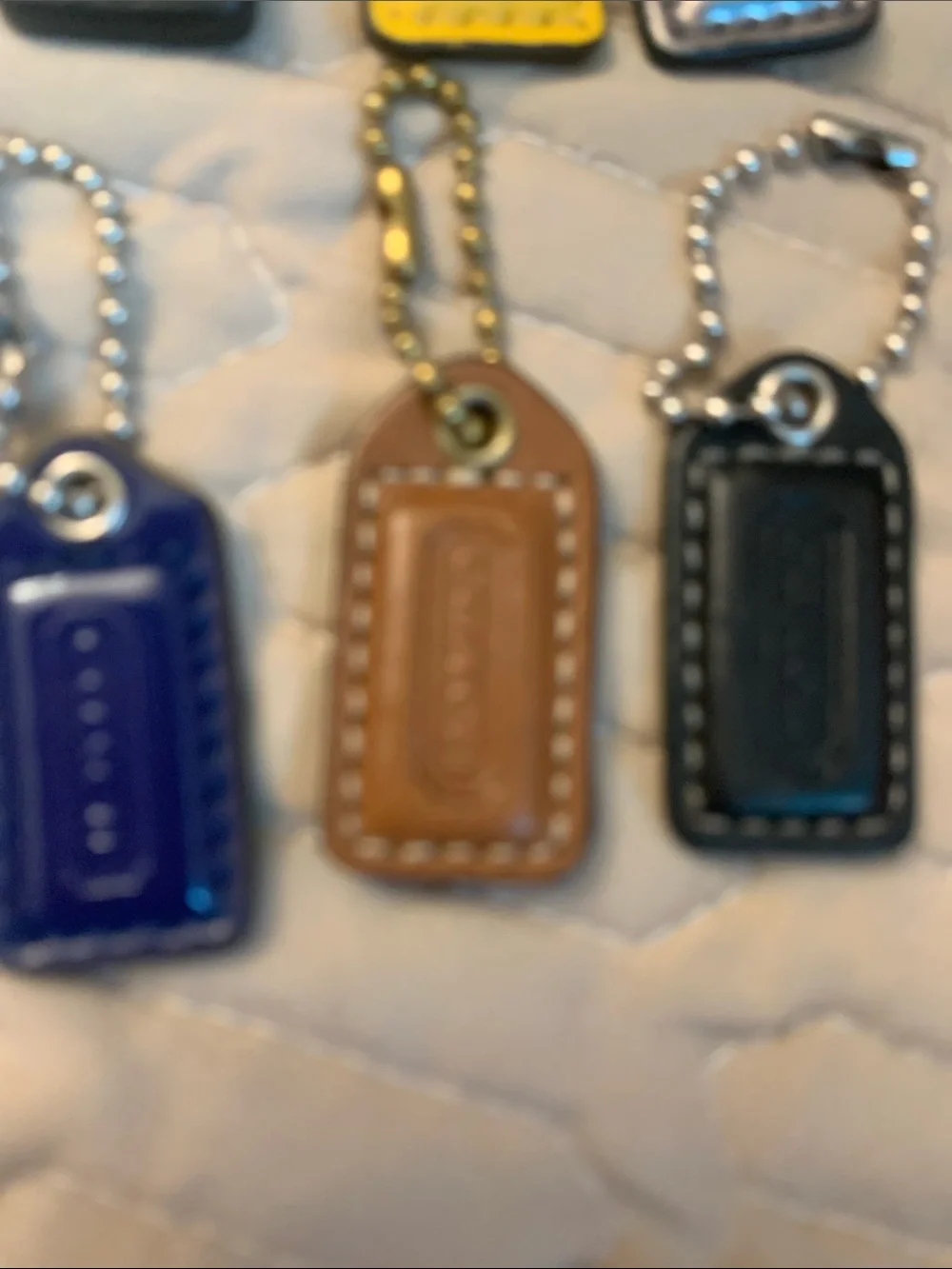 Bundle 7 Coach Leather Tag Keychain Set - Yellow, Blue, Brown, Black, Silver